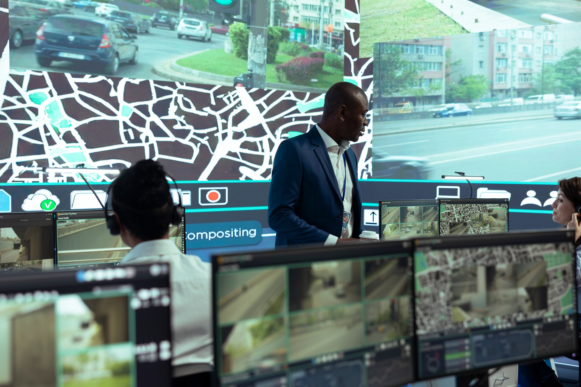 African american supervisor managing his team in control center